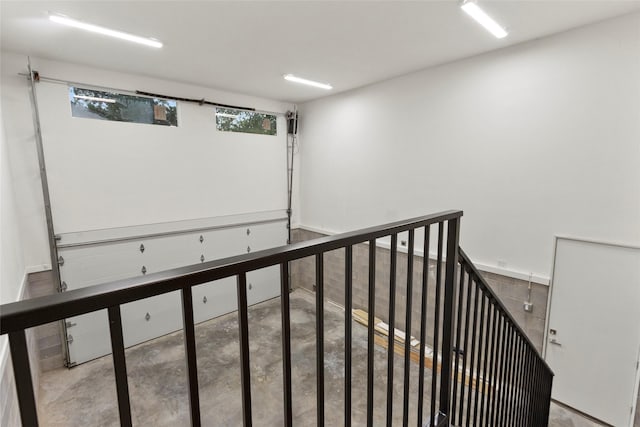 interior space with concrete floors and a healthy amount of sunlight