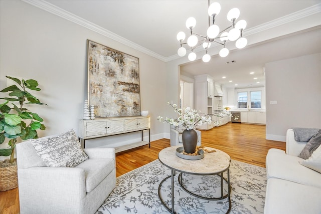 1343 Allston St, Houston, TX 77008 - living room with crown molding, baseboards, a notable chandelier, and wood finished floors