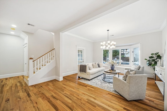 1343 Allston St, Houston, TX 77008 - living area with stairway, ornamental molding, wood finished floors, and visible vents