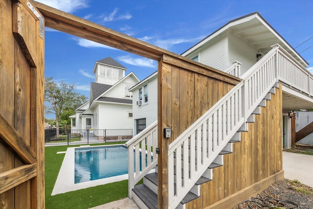 1343 Allston St, Houston, TX 77008 - exterior space with fence, stairs, a deck, a fenced in pool, and a lawn