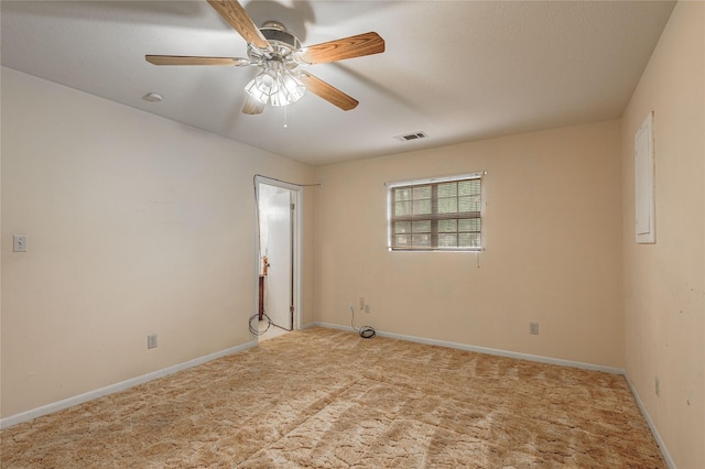 350 Shoreline Dr, Huntsville, TX 77320 - unfurnished room with baseboards, visible vents, ceiling fan, and carpet floors