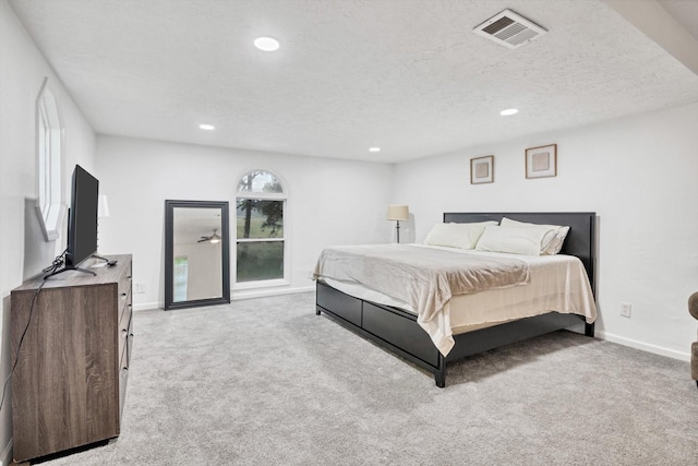 561 Brandon Rd, Conroe, TX 77302 - carpeted bedroom featuring recessed lighting, a textured ceiling, visible vents, and baseboards