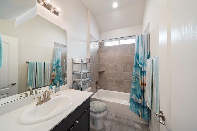 bathroom with vaulted ceiling, shower / bath combo with shower curtain, toilet, and vanity
