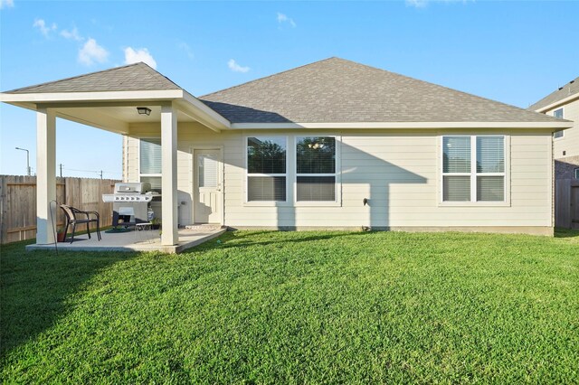 152 Bayou Bend Blvd, Angleton, TX 77515 - back of property with a patio area and roof with shingles