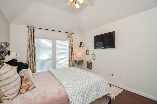 bedroom featuring ceiling fan, baseboards, vaulted ceiling, and dark wood finished floors