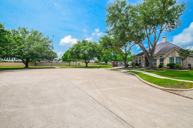 view of community featuring a lawn
