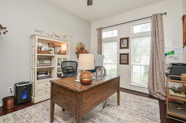 office with wood finished floors and baseboards