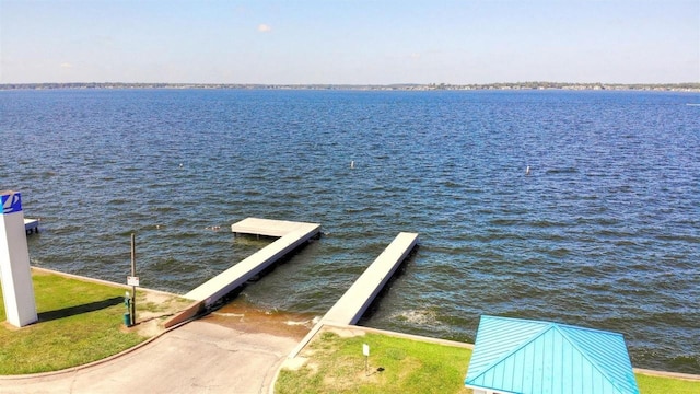 12975 Corona Ct, Willis, TX 77318 - view of dock with a water view