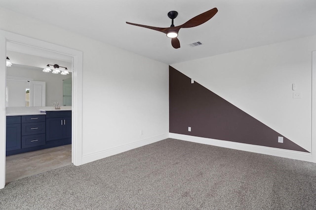 12975 Corona Ct, Willis, TX 77318 - bonus room with a ceiling fan, visible vents, light colored carpet, a sink, and baseboards