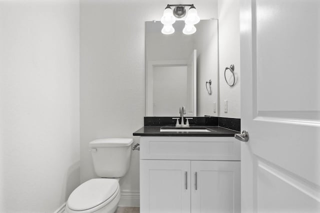 12975 Corona Ct, Willis, TX 77318 - half bathroom with toilet and vanity