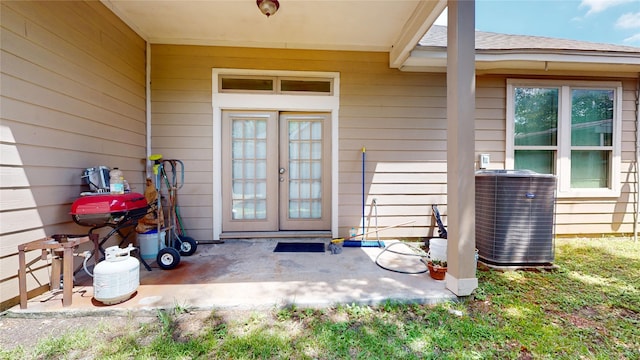 property entrance with central AC and french doors