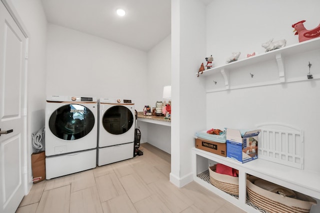washroom with laundry area, recessed lighting, and washer and dryer