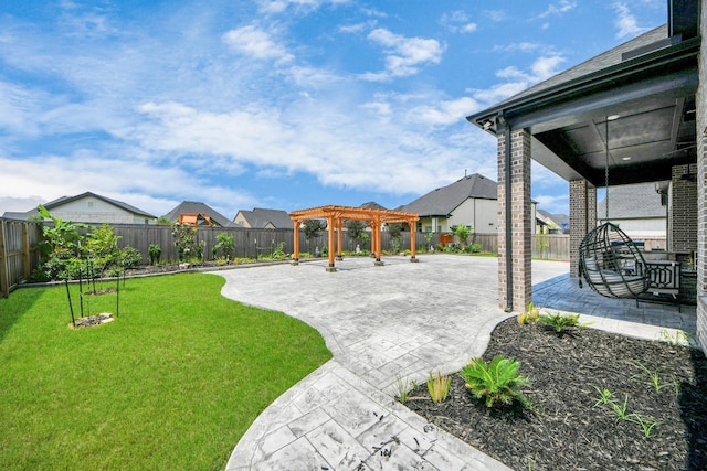 view of yard with a pergola, a patio, and a fenced backyard