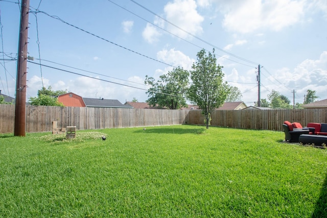 view of yard featuring a fenced backyard