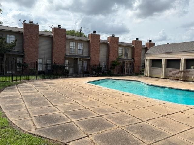 10501 S Dr Unit 246, Houston, TX 77099 - pool featuring fence and a patio area