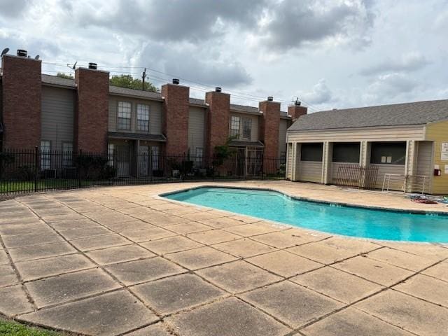 10501 S Dr Unit 246, Houston, TX 77099 - community pool featuring fence and a patio