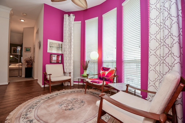 sitting room featuring baseboards, recessed lighting, wood finished floors, and ceiling fan
