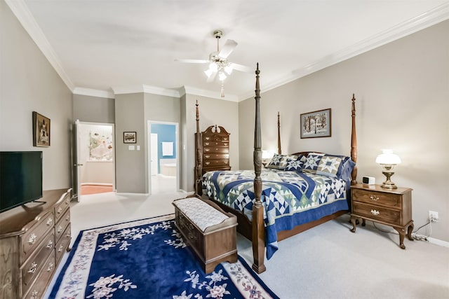 carpeted bedroom featuring a ceiling fan, baseboards, and ornamental molding