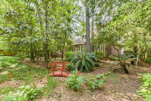 view of yard with fence