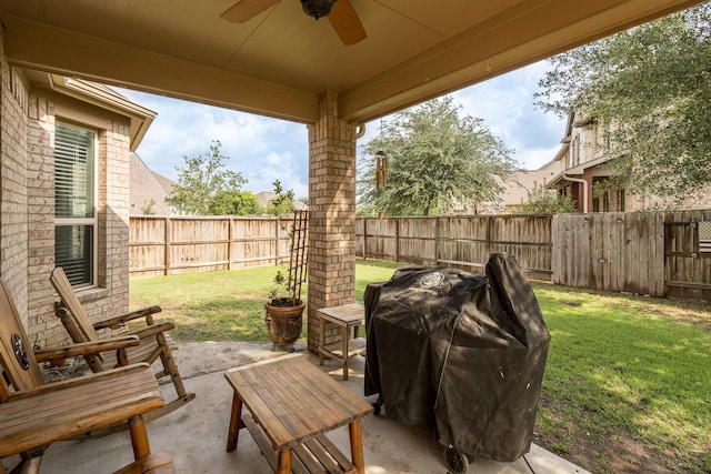 view of patio / terrace featuring ceiling fan and a fenced backyard