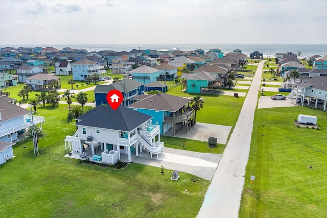 978 Sue Dr, Crystal Beach, TX 77650 - aerial view featuring a residential view and a water view