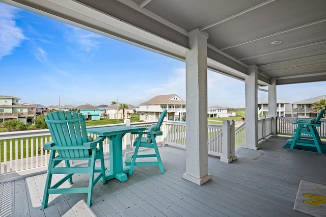 978 Sue Dr, Crystal Beach, TX 77650 - wooden terrace with a residential view