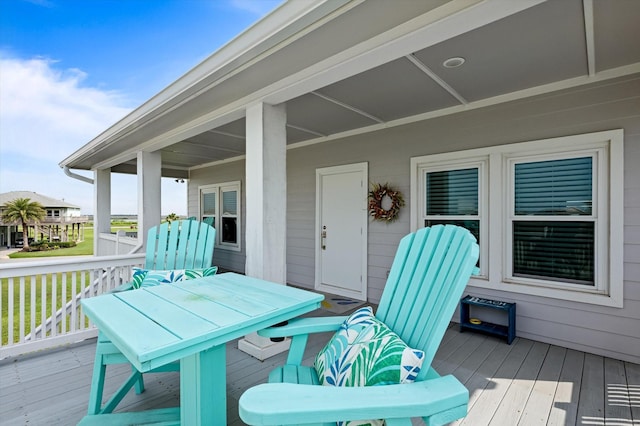 978 Sue Dr, Crystal Beach, TX 77650 - deck with outdoor dining area