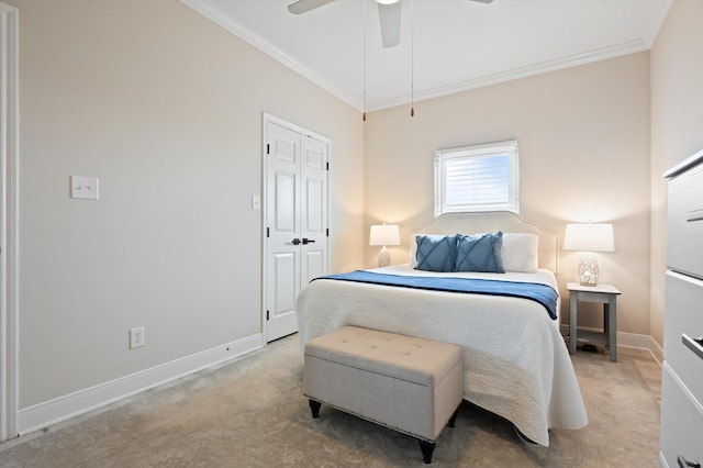 978 Sue Dr, Crystal Beach, TX 77650 - carpeted bedroom featuring crown molding, a ceiling fan, and baseboards