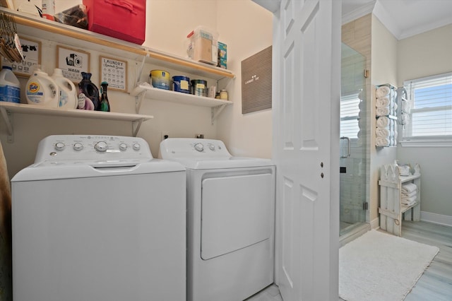 978 Sue Dr, Crystal Beach, TX 77650 - laundry area with wood finished floors, independent washer and dryer, and laundry area