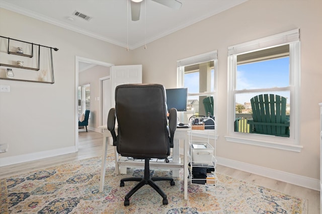 978 Sue Dr, Crystal Beach, TX 77650 - office area featuring light wood finished floors, visible vents, and plenty of natural light