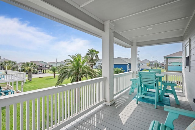 978 Sue Dr, Crystal Beach, TX 77650 - deck with a residential view and a lawn