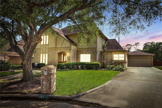16615 Brendon Ct, Spring, TX 77379 - view of front facade featuring a shingled roof, stucco siding, a front lawn, and brick siding
