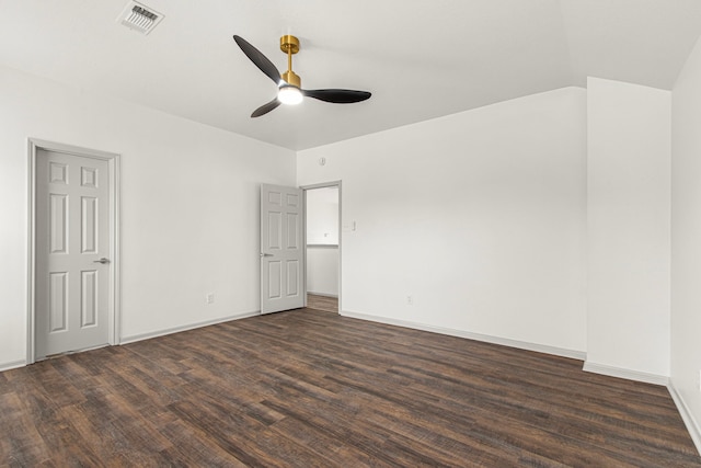 unfurnished bedroom with dark wood-type flooring, visible vents, ceiling fan, and baseboards