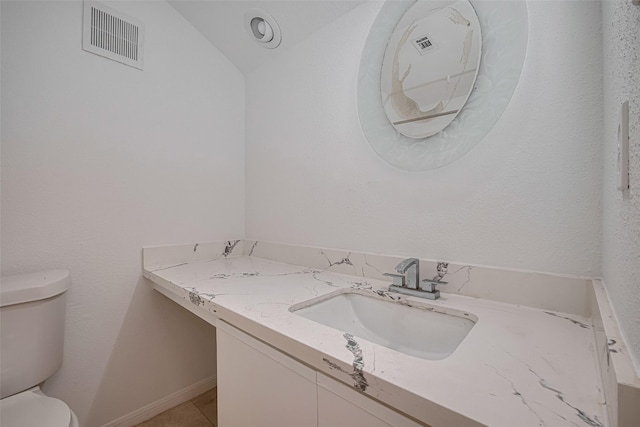 16800 Sugar Pines Dr Unit D28, Houston, TX 77090 - bathroom featuring tile patterned floors, visible vents, toilet, and vanity