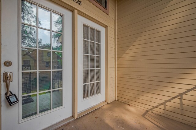 16800 Sugar Pines Dr Unit D28, Houston, TX 77090 - doorway to property with a patio