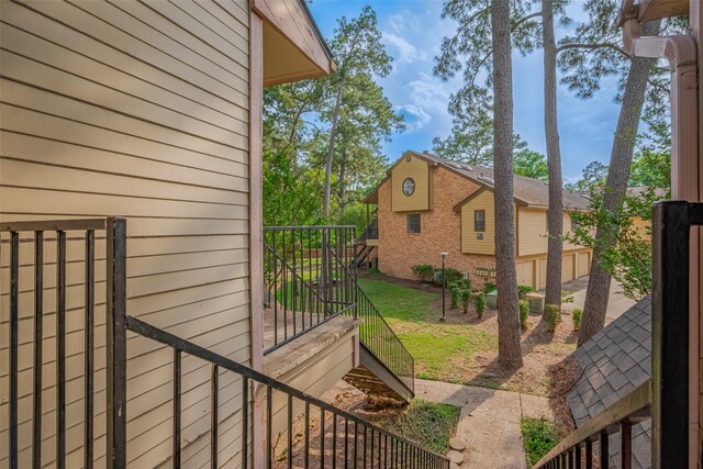 16800 Sugar Pines Dr Unit D28, Houston, TX 77090 - view of gate featuring stairway