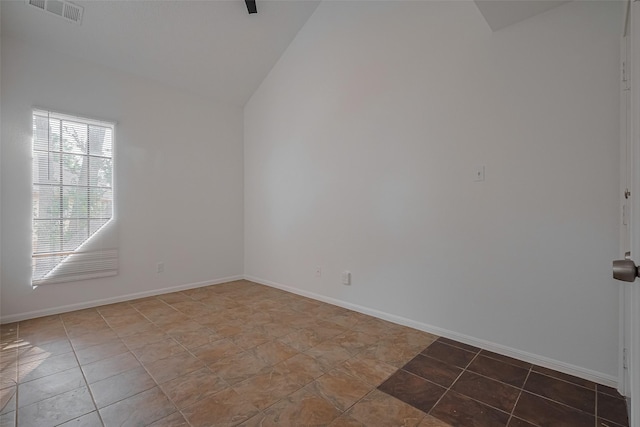 16800 Sugar Pines Dr Unit D28, Houston, TX 77090 - unfurnished room featuring baseboards, visible vents, tile patterned floors, and lofted ceiling
