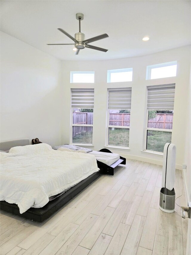 1902 Longcroft Ln, Katy, TX 77493 - bedroom with light wood-style flooring, a ceiling fan, baseboards, and recessed lighting