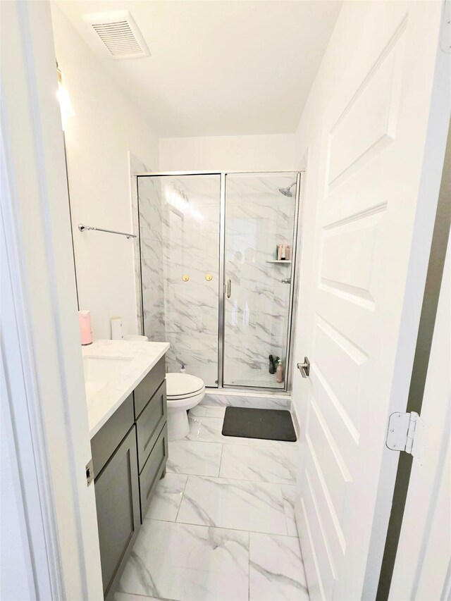 1902 Longcroft Ln, Katy, TX 77493 - full bath with toilet, a marble finish shower, vanity, and marble finish floors