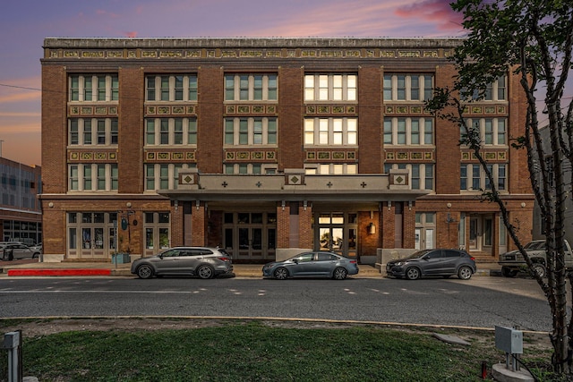 view of property at dusk