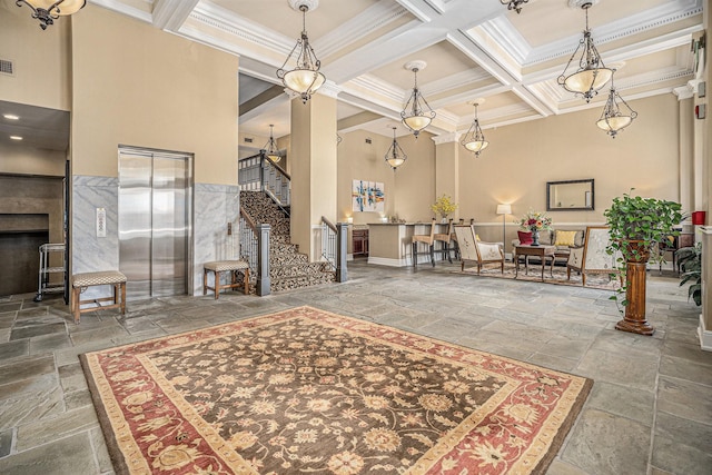 common area with visible vents and stairway