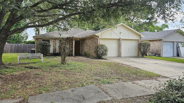 ranch-style home featuring brick siding, driveway, a garage, and fence