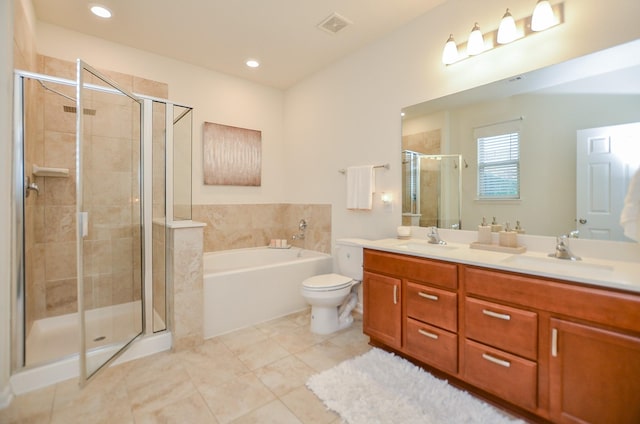 bathroom featuring double vanity, a sink, a garden tub, and a stall shower