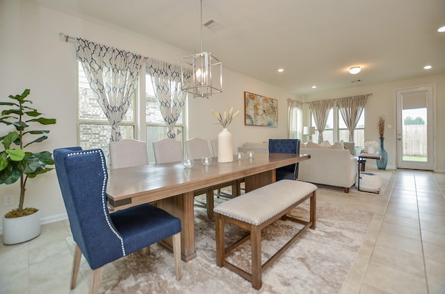 dining room with visible vents, light tile patterned floors, baseboards, an inviting chandelier, and recessed lighting