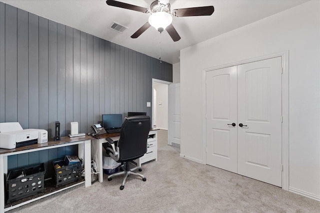 office area with carpet floors, ceiling fan, and baseboards