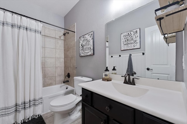 full bathroom with toilet, shower / bath combination with curtain, and vanity