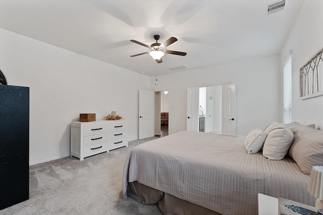 carpeted bedroom with a ceiling fan