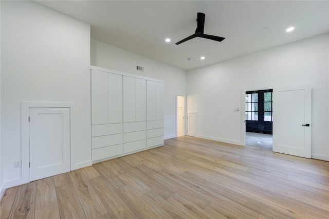 unfurnished bedroom featuring recessed lighting, light wood-style floors, baseboards, visible vents, and french doors