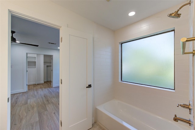 bathroom with wood finished floors, visible vents, and recessed lighting