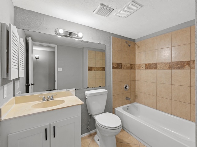 full bathroom featuring toilet, visible vents, vanity, and tile patterned flooring
